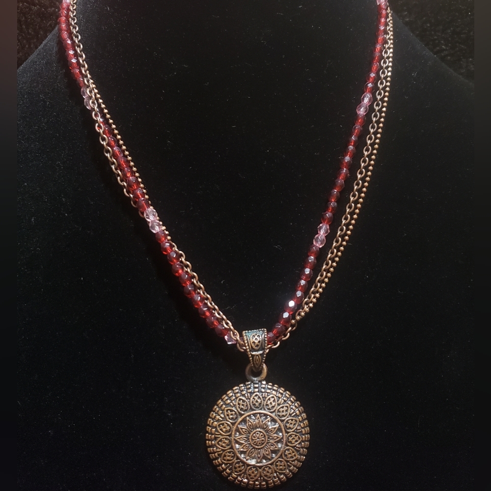Cooper locket with 3 strands of chains and crystals